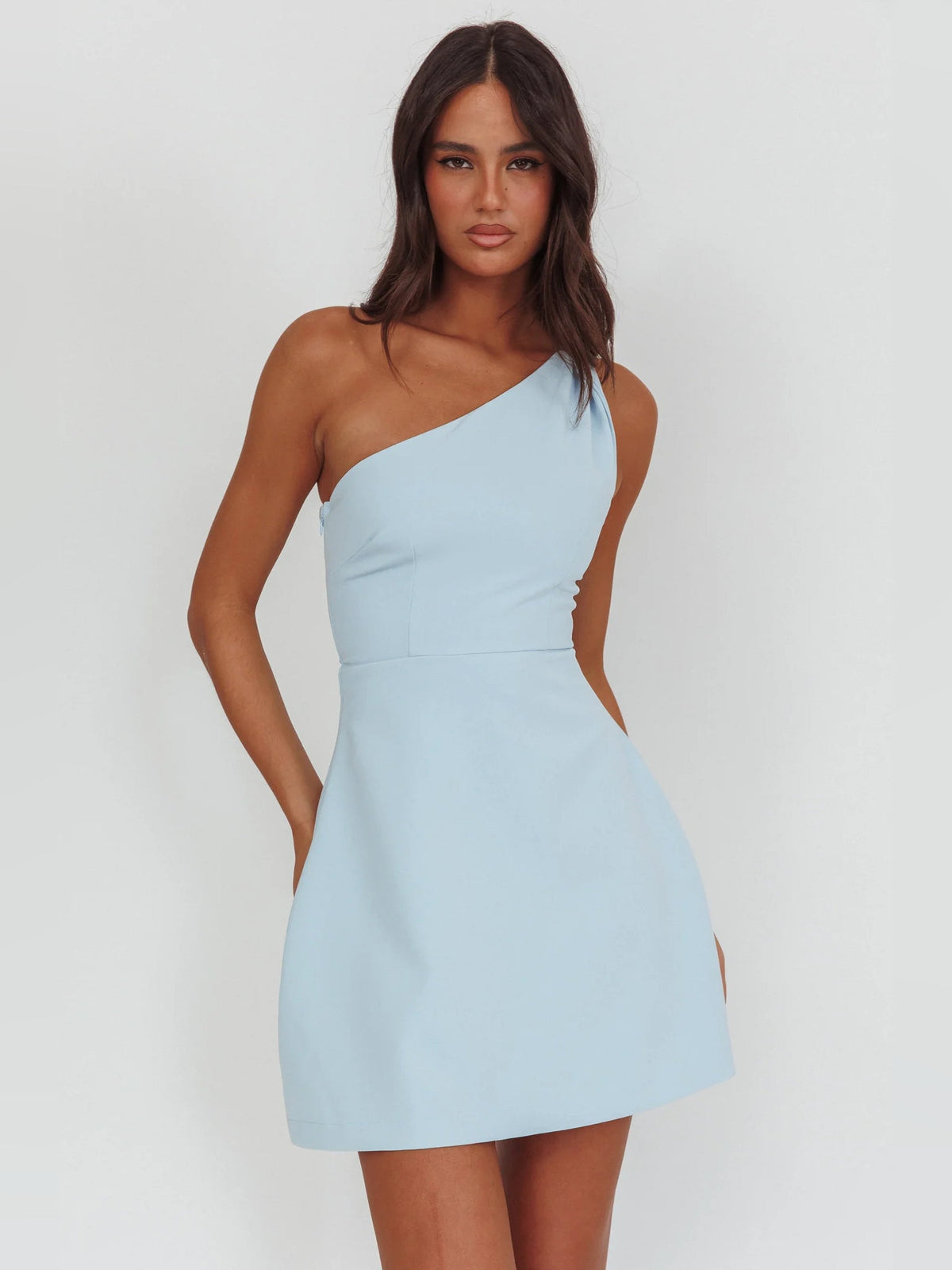 Light blue one-shoulder mini dress with asymmetric neckline and flared skirt