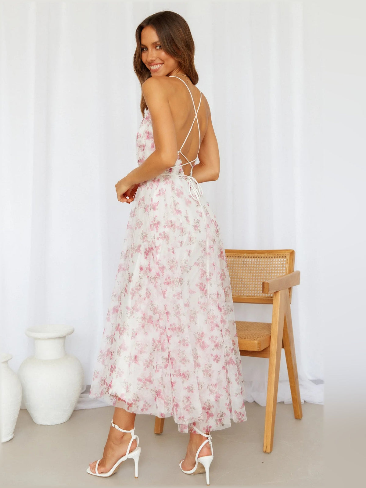 Pink floral midi dress open back with crisscross straps and layered tiered skirt