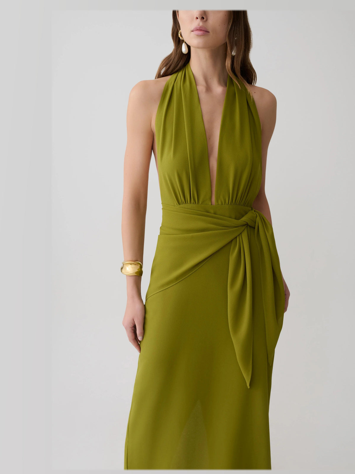 Green formal dress with a-line detailing