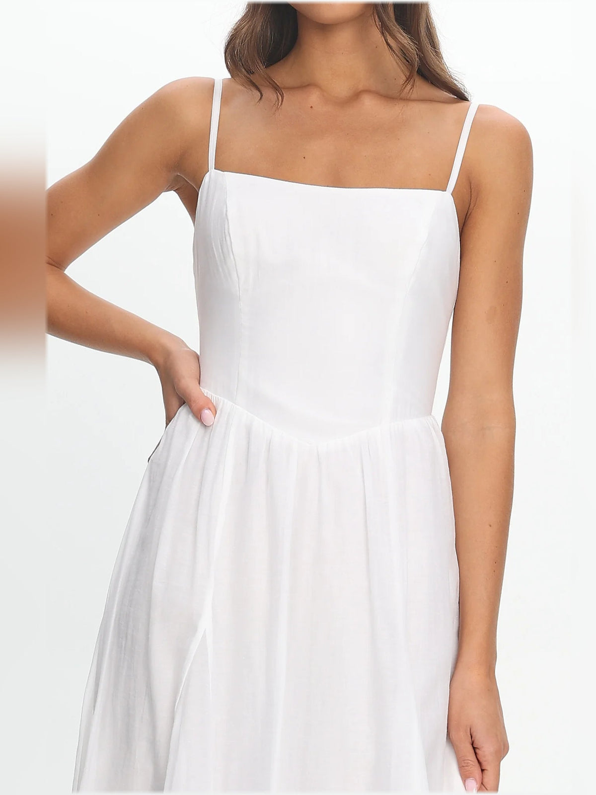 White scoop-neck midi dress bodice with spaghetti straps and gathered waist