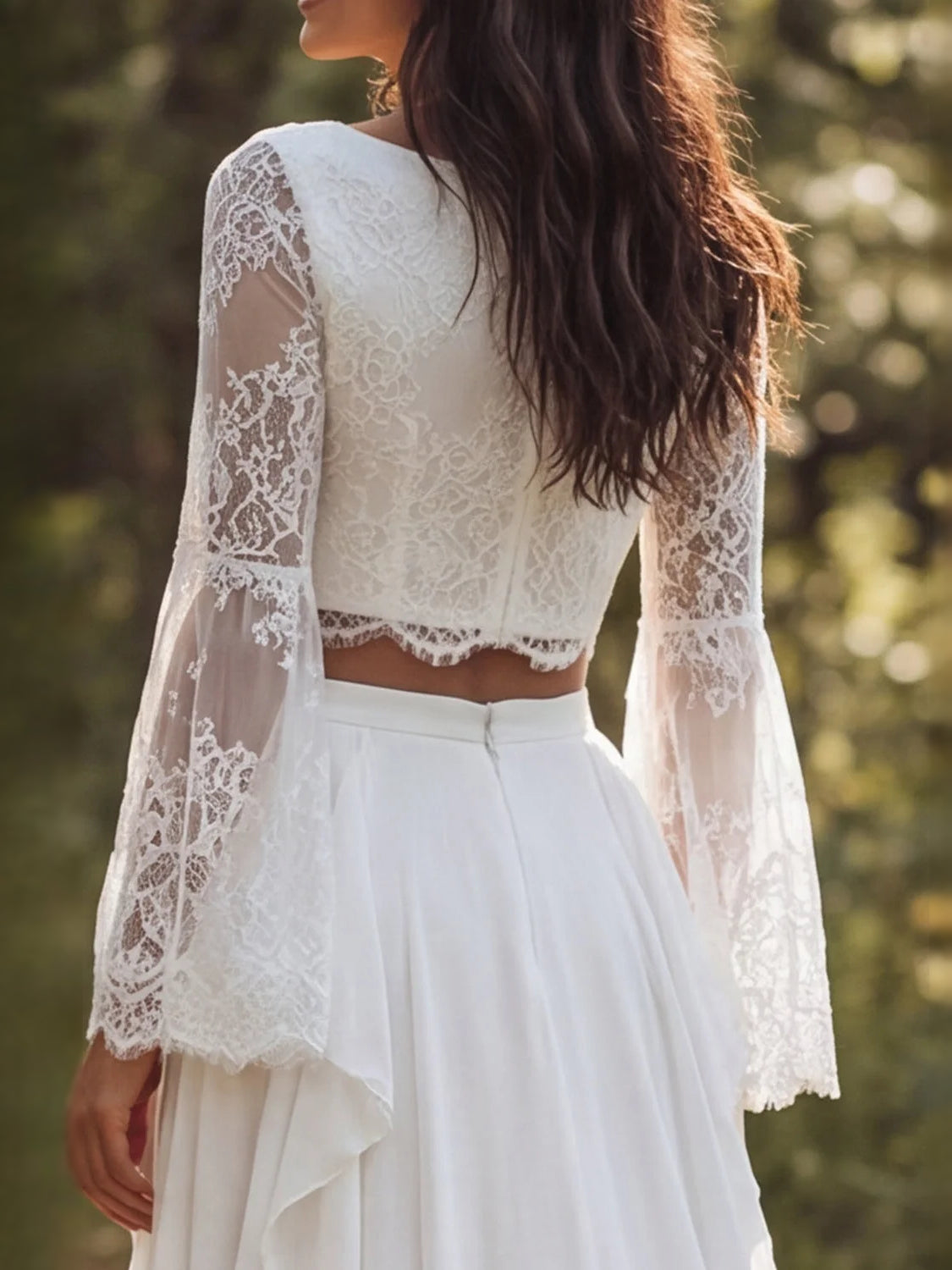 Ivory A-line wedding dress with lace long sleeves, scalloped lace trim, and layered slit skirt