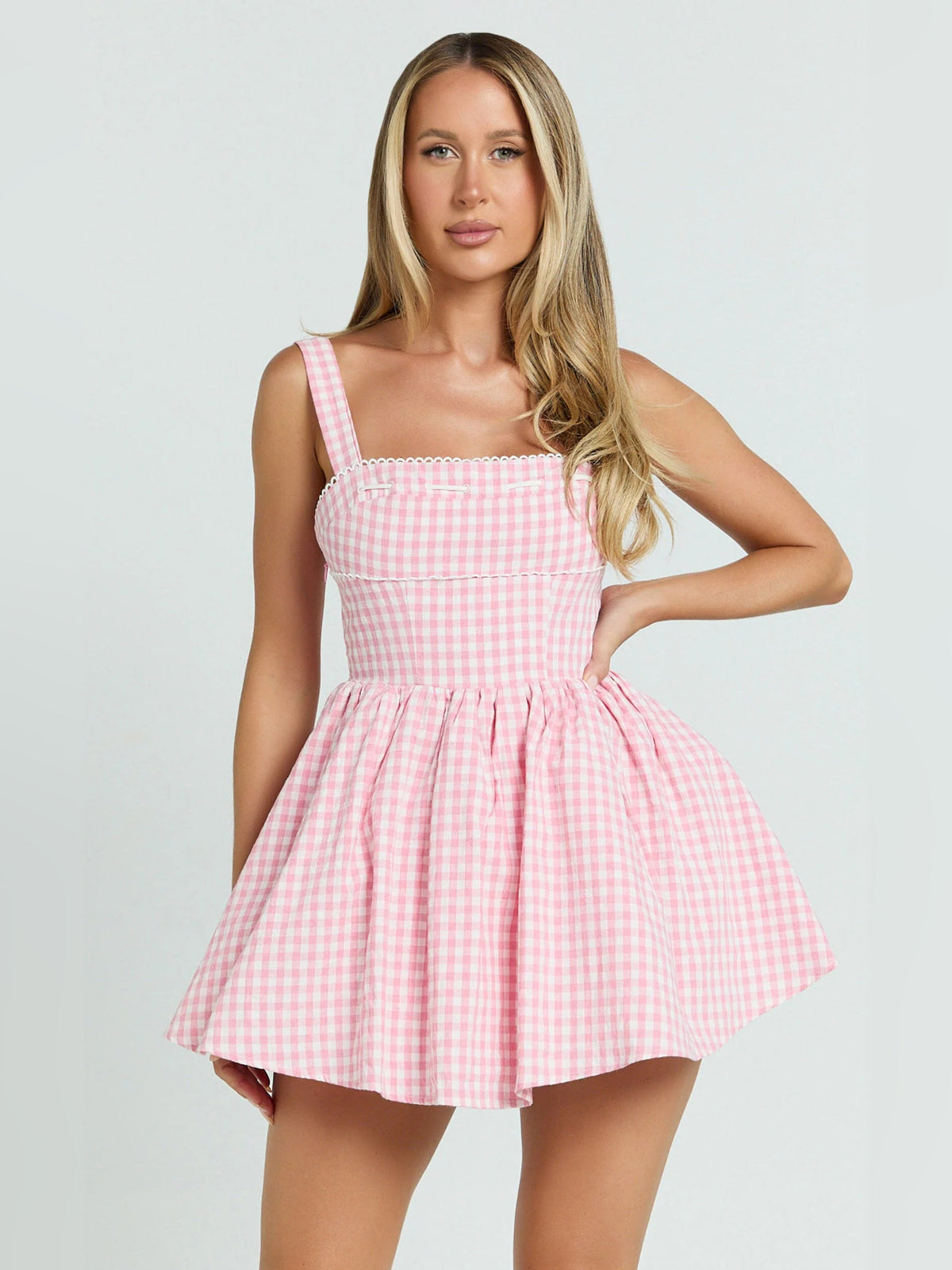 Pink gingham sleeveless mini dress, square neckline with gathered waist