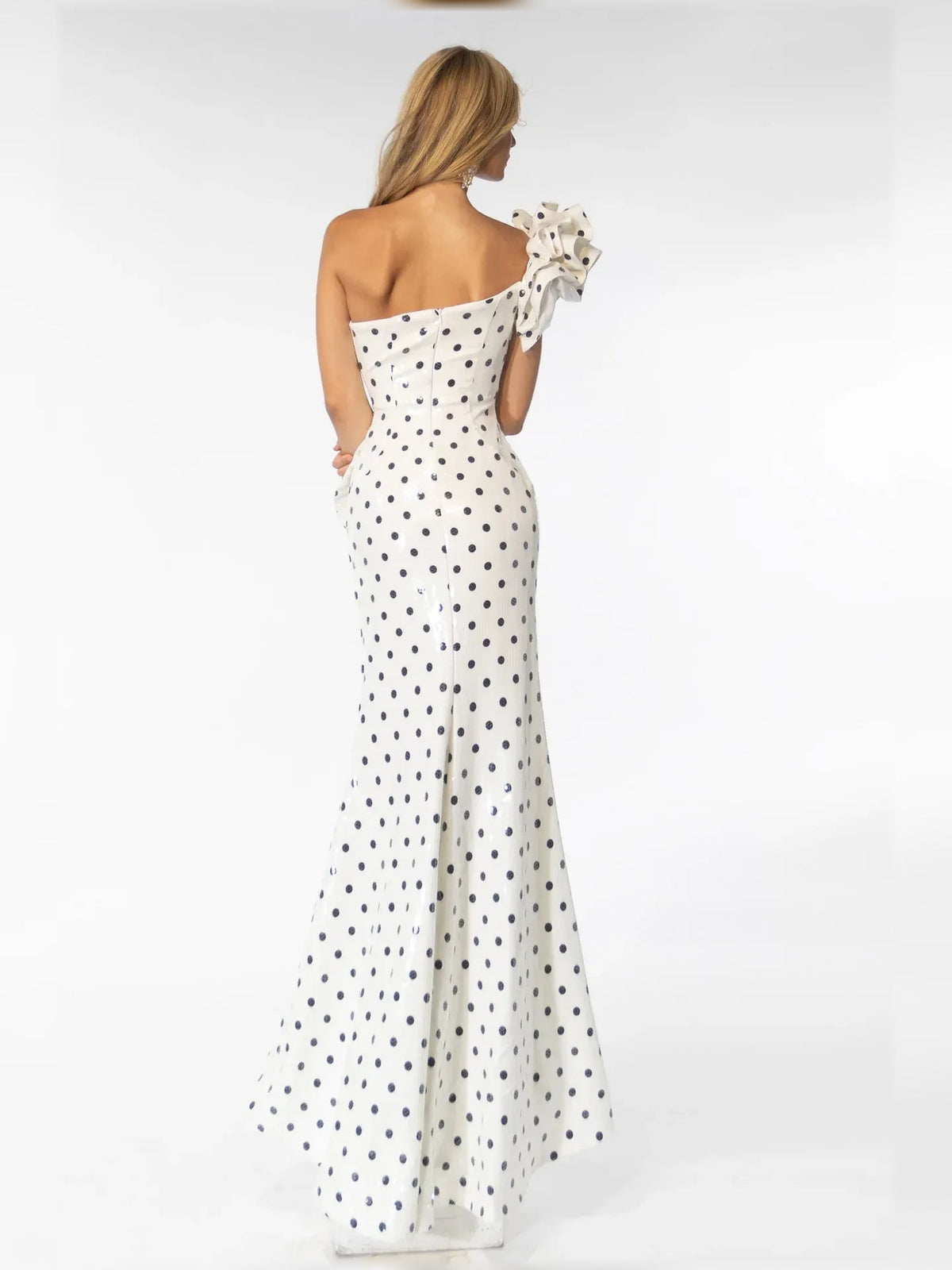 White polka dot one-shoulder formal dress with ruffled back and draped skirt