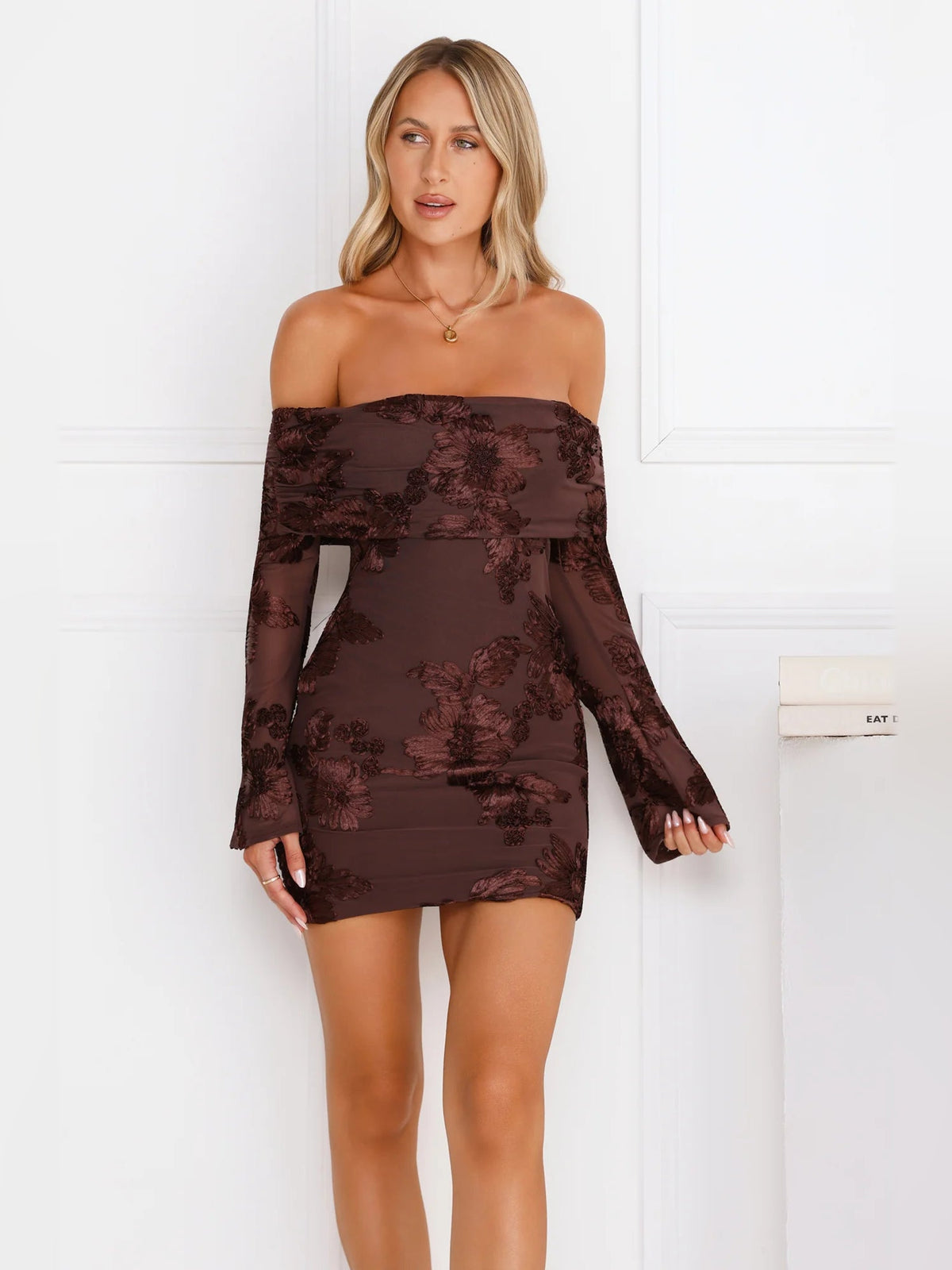 Chocolate off-shoulder mini dress with floral pattern and long sheer sleeve details