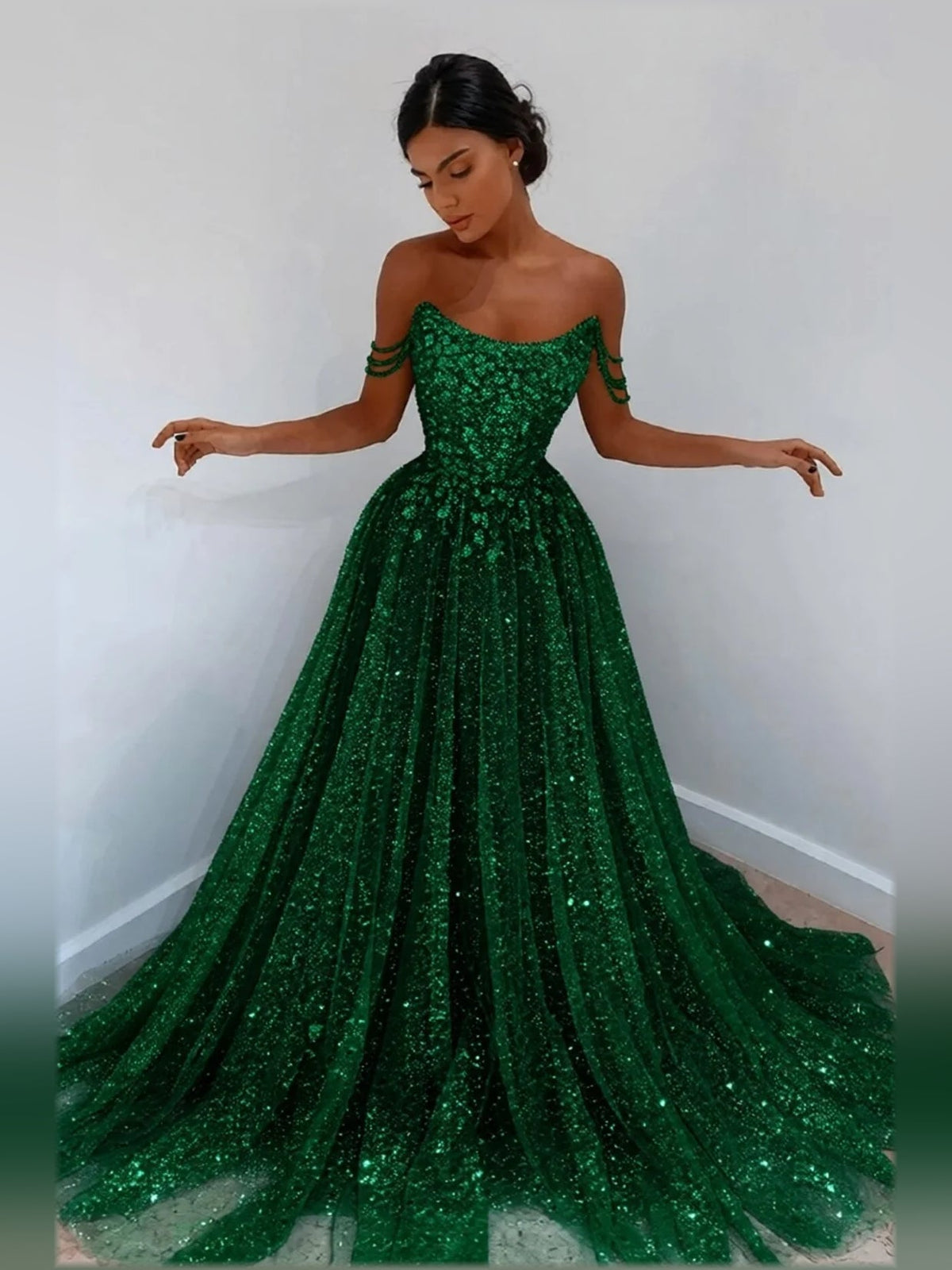 Off-shoulder green glitter tulle formal dress with sweetheart neckline and full skirt