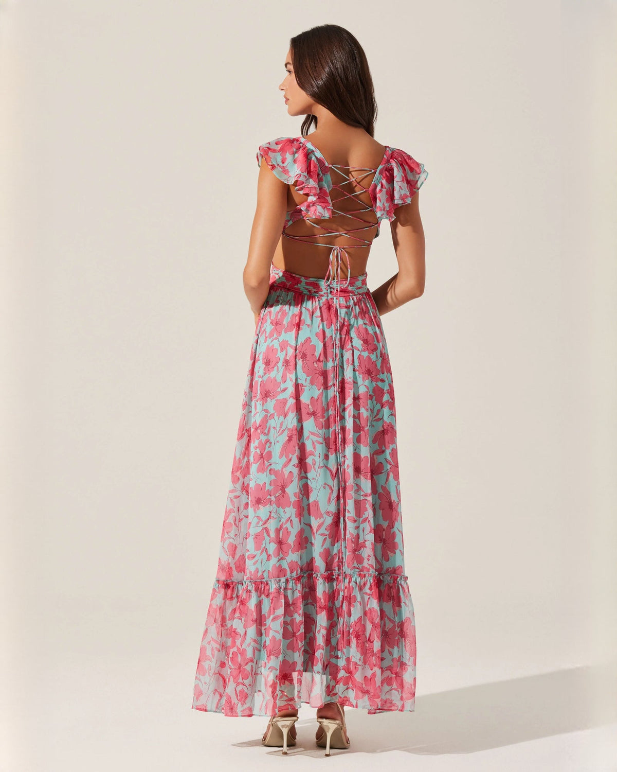 Floral sleeveless maxi dress with lace-up open back, pink and teal print