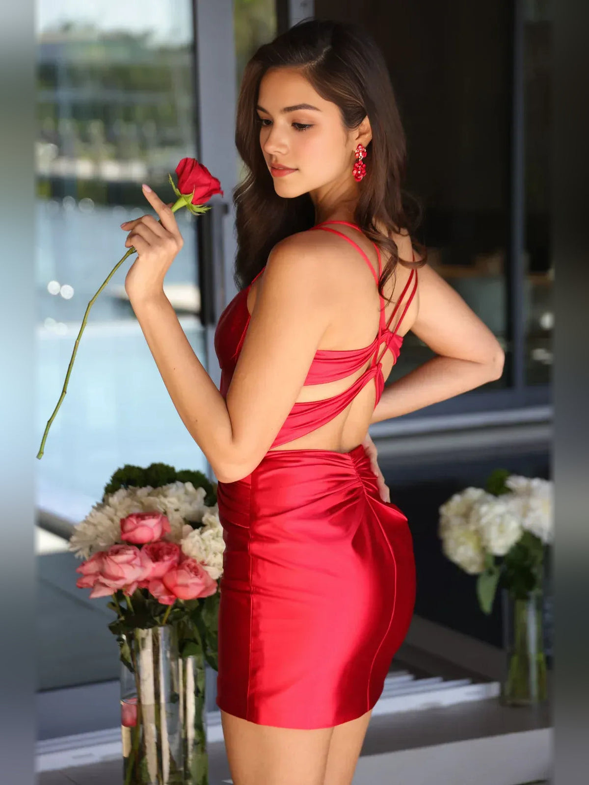 Crimson satin mini dress, open back with crisscross straps and ruched waist