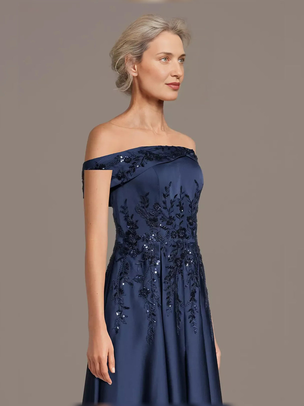 Dark navy off-shoulder satin maxi dress with beaded sequins and floral motif
