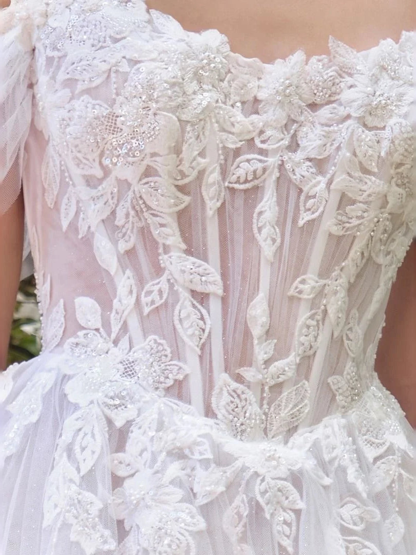 Ivory corset bodice with 3D floral lace, ruffled trim, and sheer tulle overlay