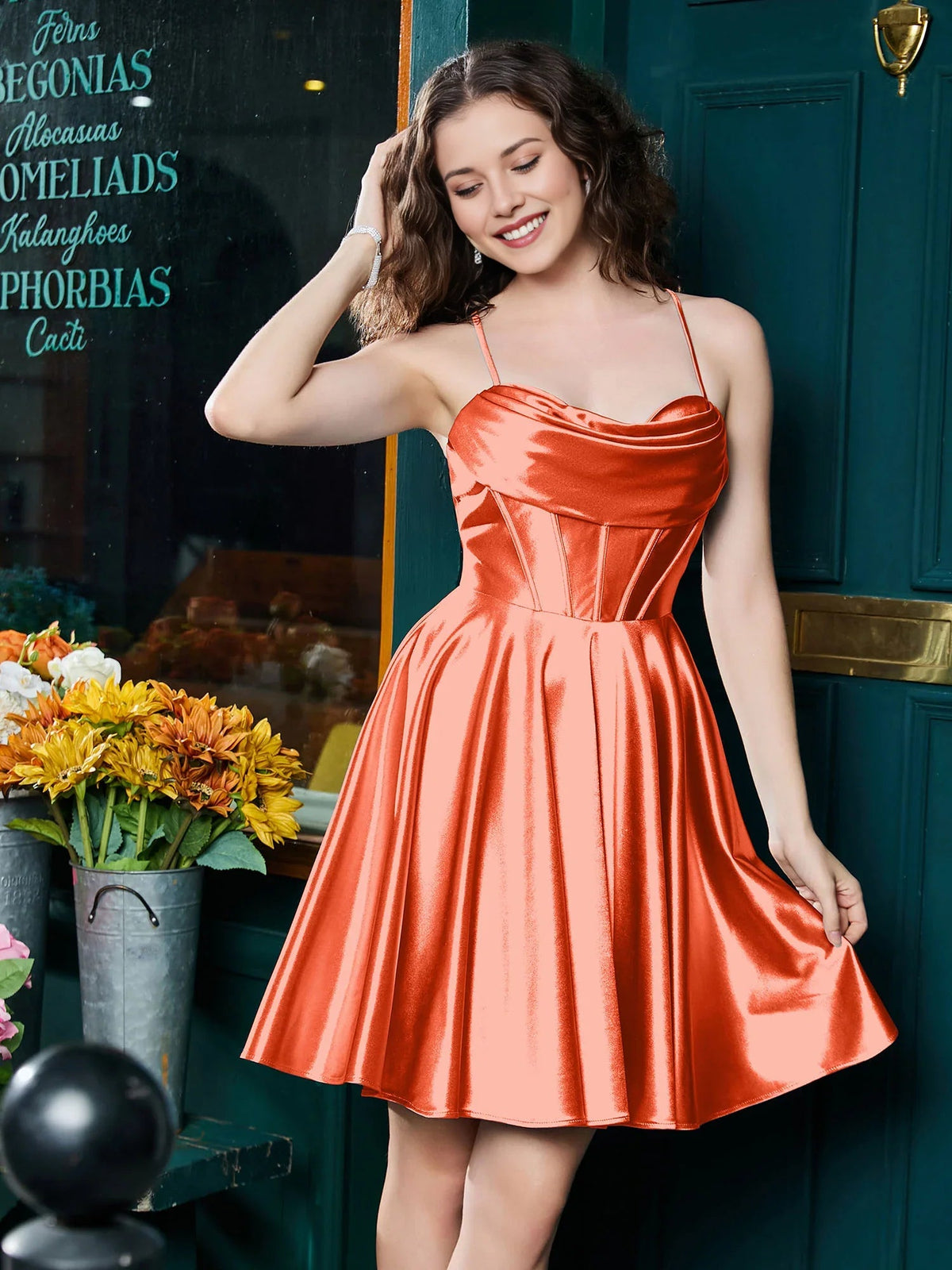 Orange satin A-line mini homecoming dress with corset bodice, cowl neck, thin straps