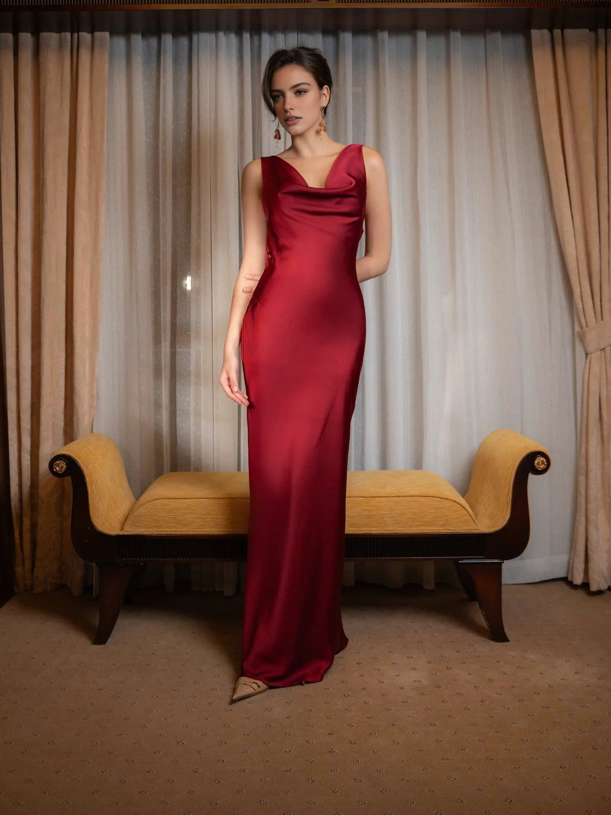 Deep red satin mermaid prom dress with cowl neckline and sleeveless draped bodice