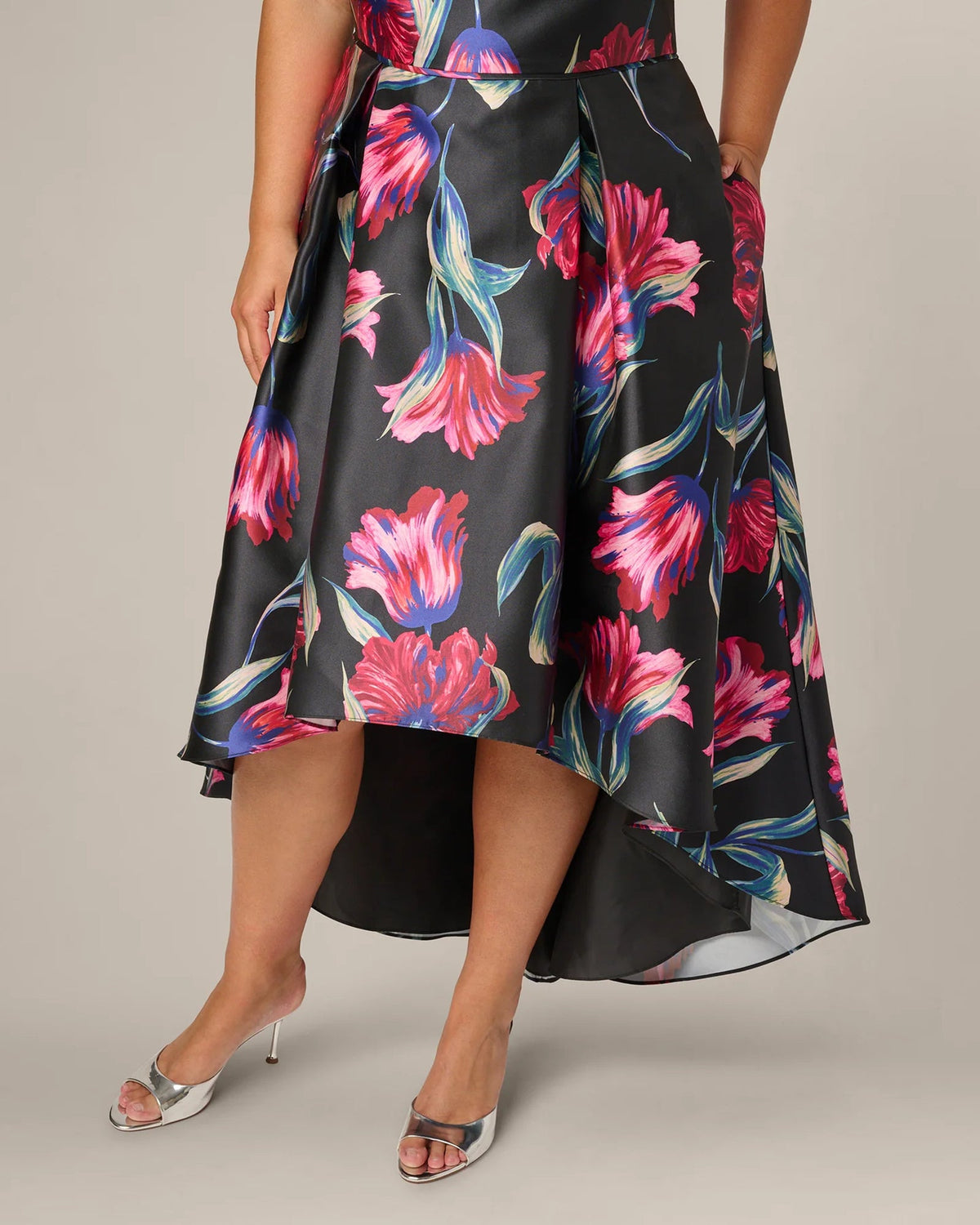 Black floral A-line maxi skirt with high-low hem, sleeveless waist tie, pink and blue flowers