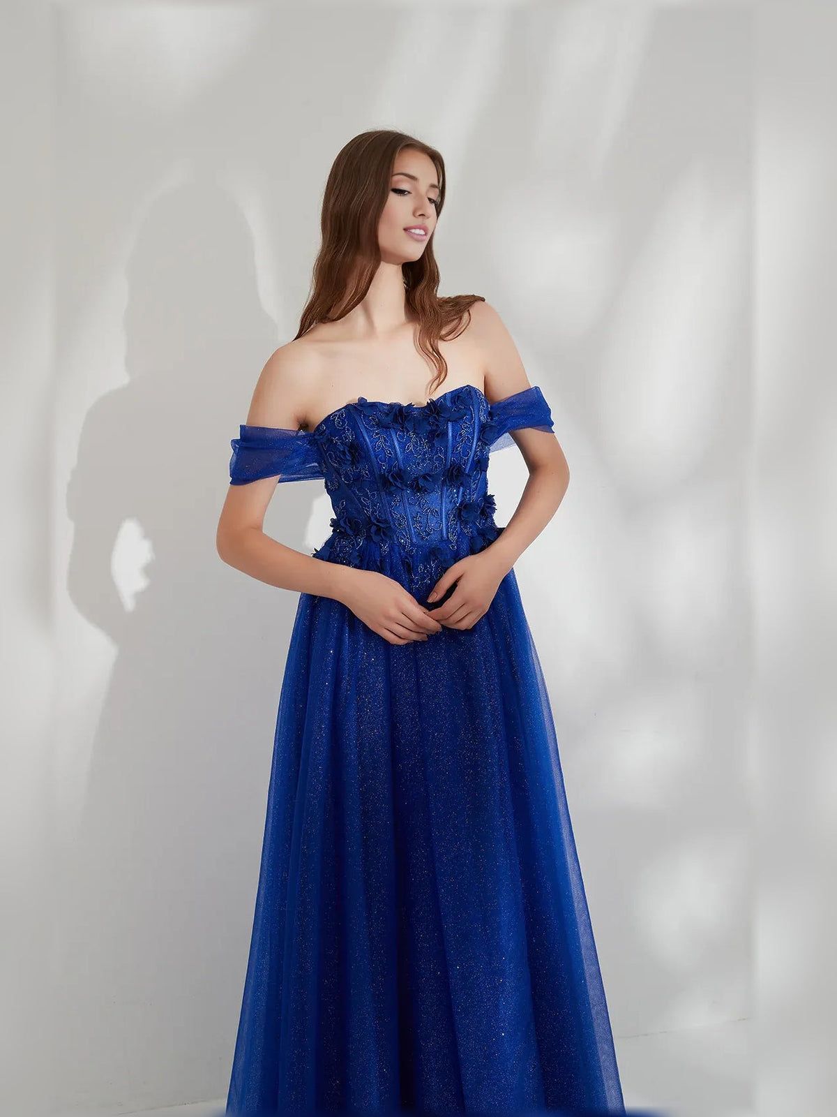 Dark blue off-shoulder formal dress with sweetheart neckline and ruffled sleeves