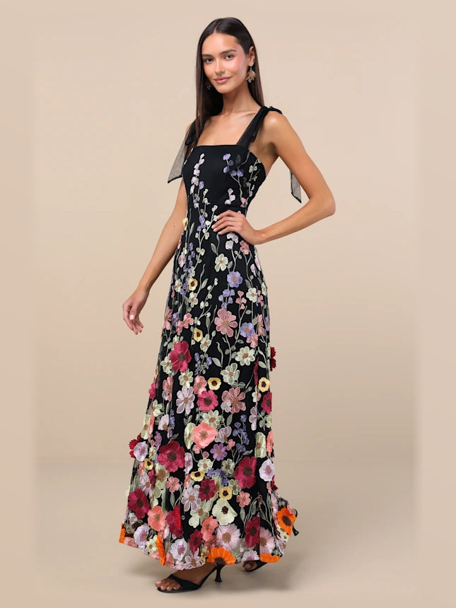 Black formal dress with 3d-floral detailing