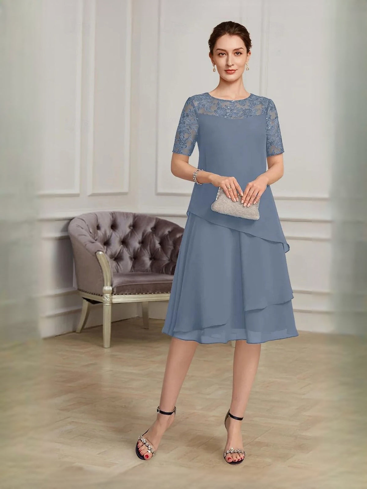 Slate blue layered chiffon midi dress with lace sleeves and tiered A-line skirt.