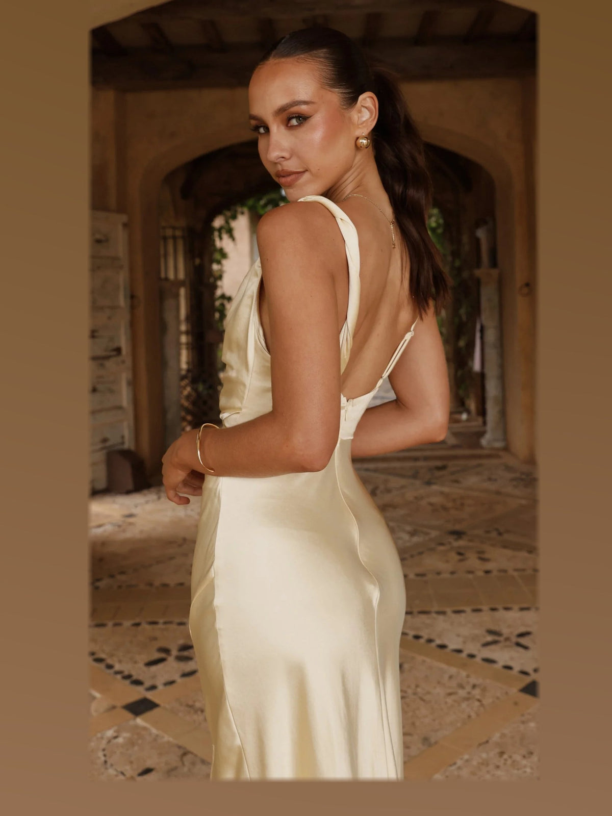 Yellow maxi formal dress, alternate full-length view showing the skirt