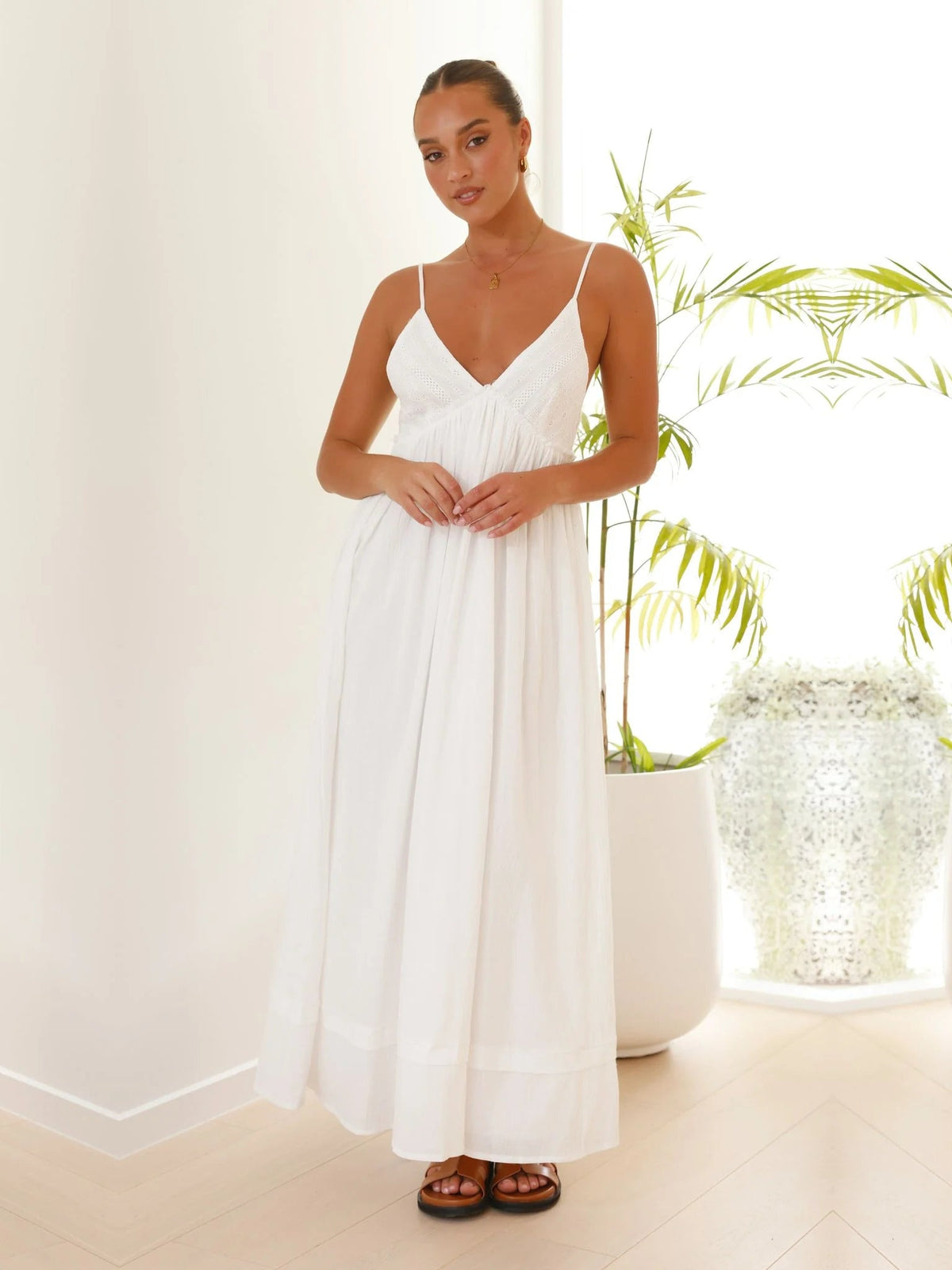 White a-line maxi formal dress with V-neckline, alternate view showing the waist