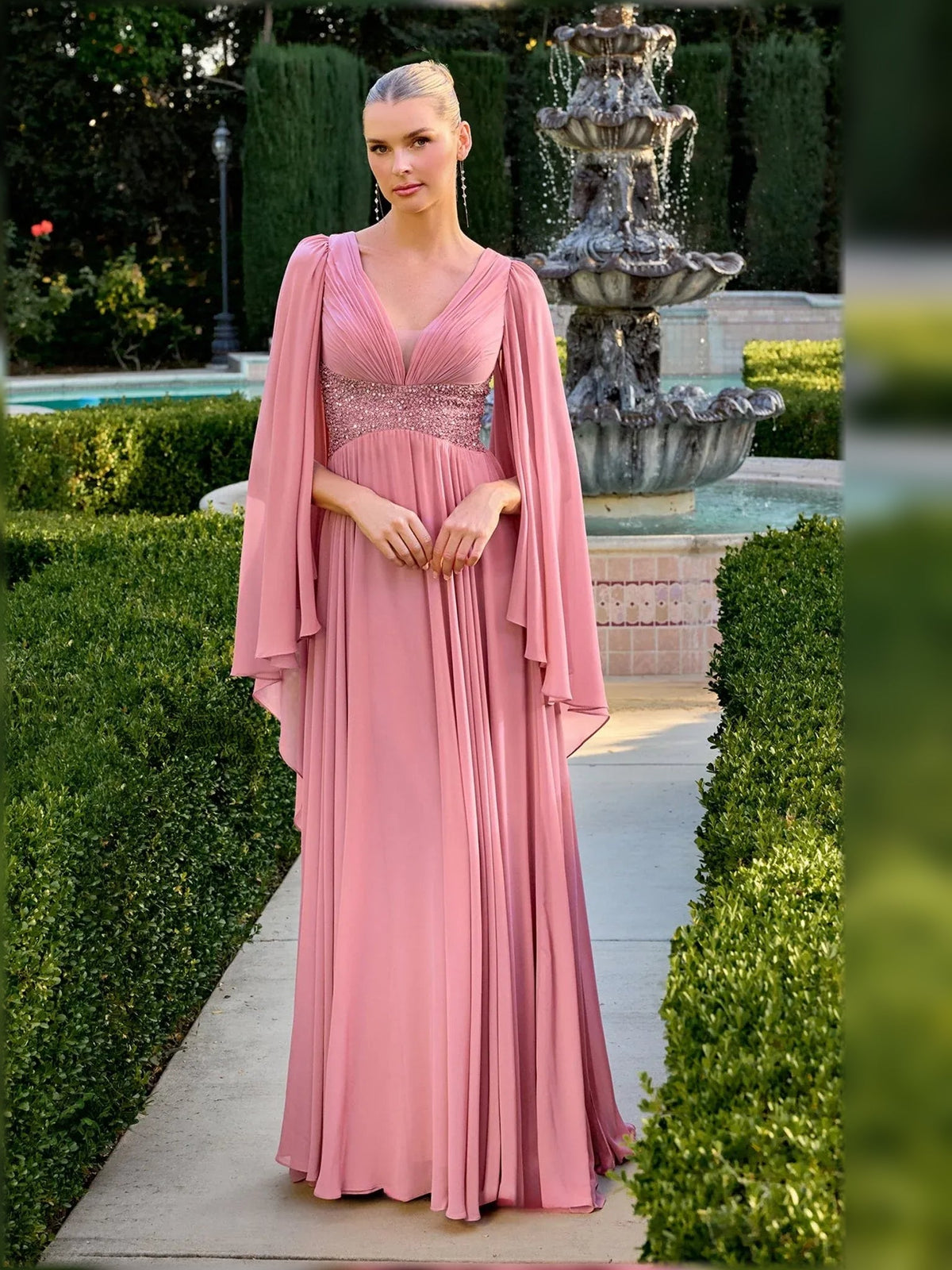 Dusty pink chiffon V-neck A-line floor dress with pleated skirt and cape sleeves