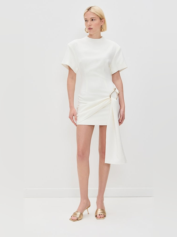 White mini dress with asym drape and gold-tone hand-tie detail at waist