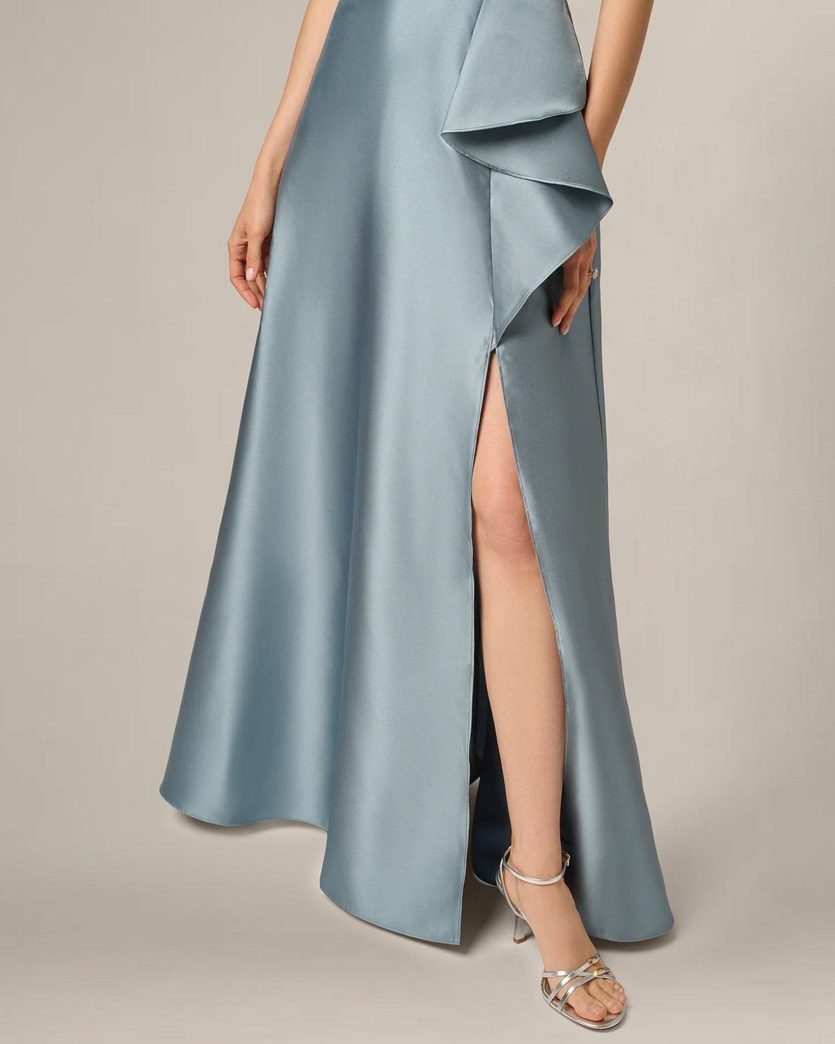 Ice blue satin-like maxi dress with asymmetrical draped overlay and side slit