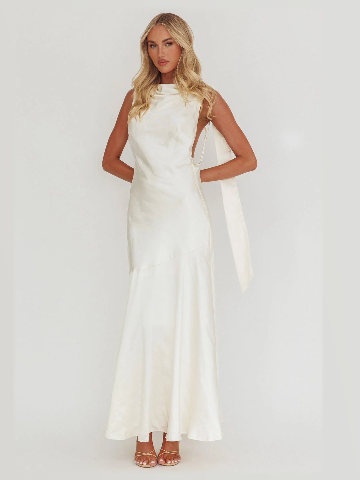Cream maxi formal dress, alternate full-length view showing the skirt
