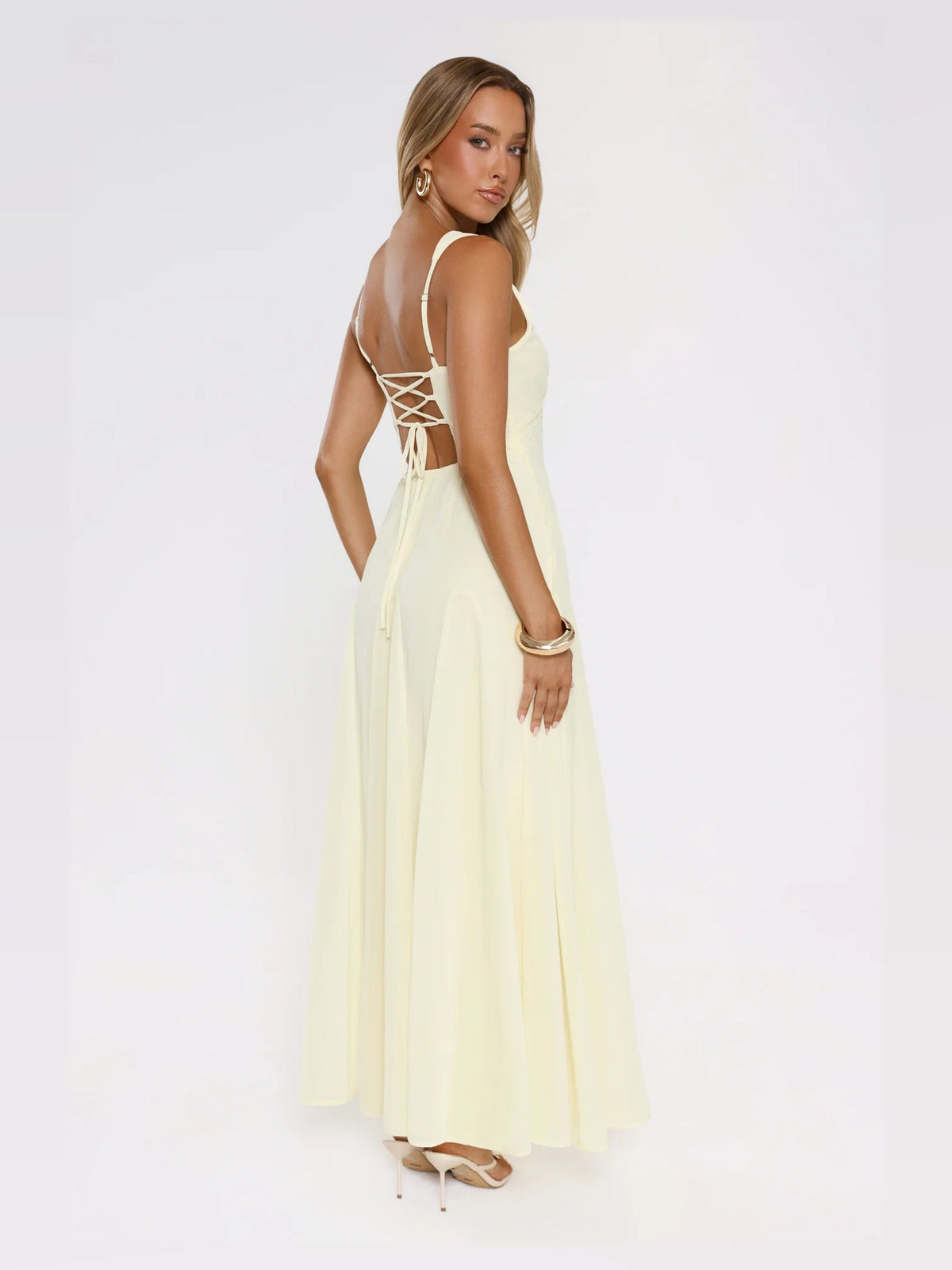 Yellow maxi formal dress, alternate full-length view showing the skirt