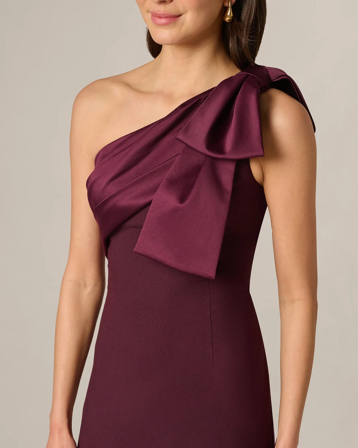One-shoulder maxi dress with oversized bow on shoulder, burgundy wine