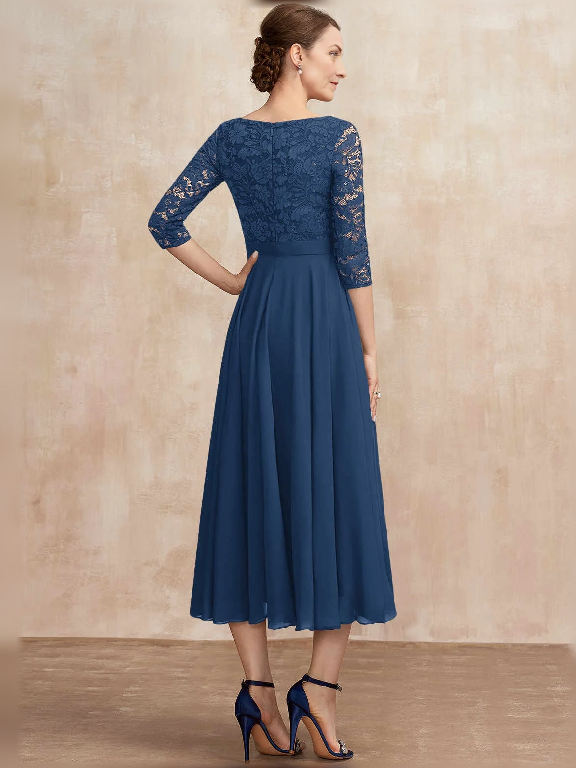 Blue sequined lace midi A-line dress with bateau neck and pleated chiffon skirt (back)