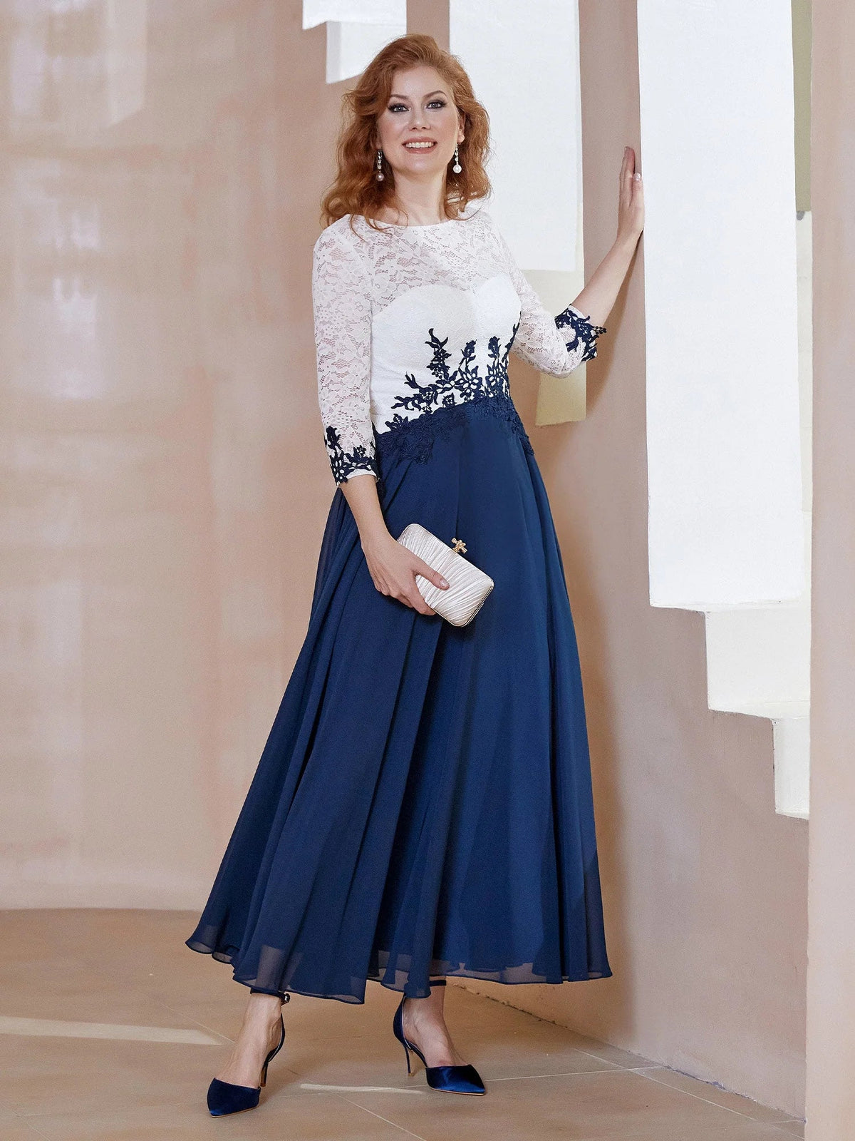 A-line ankle-length formal dress with white lace bodice and dark navy floral appliqué skirt