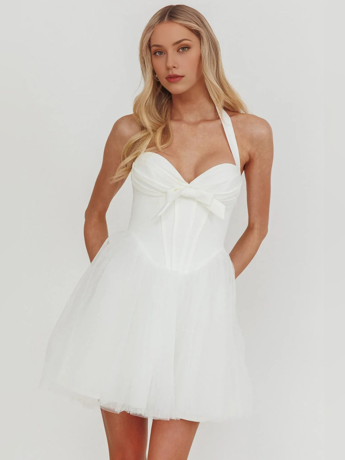 White halter bow mini dress with A-line tulle skirt and corset bodice