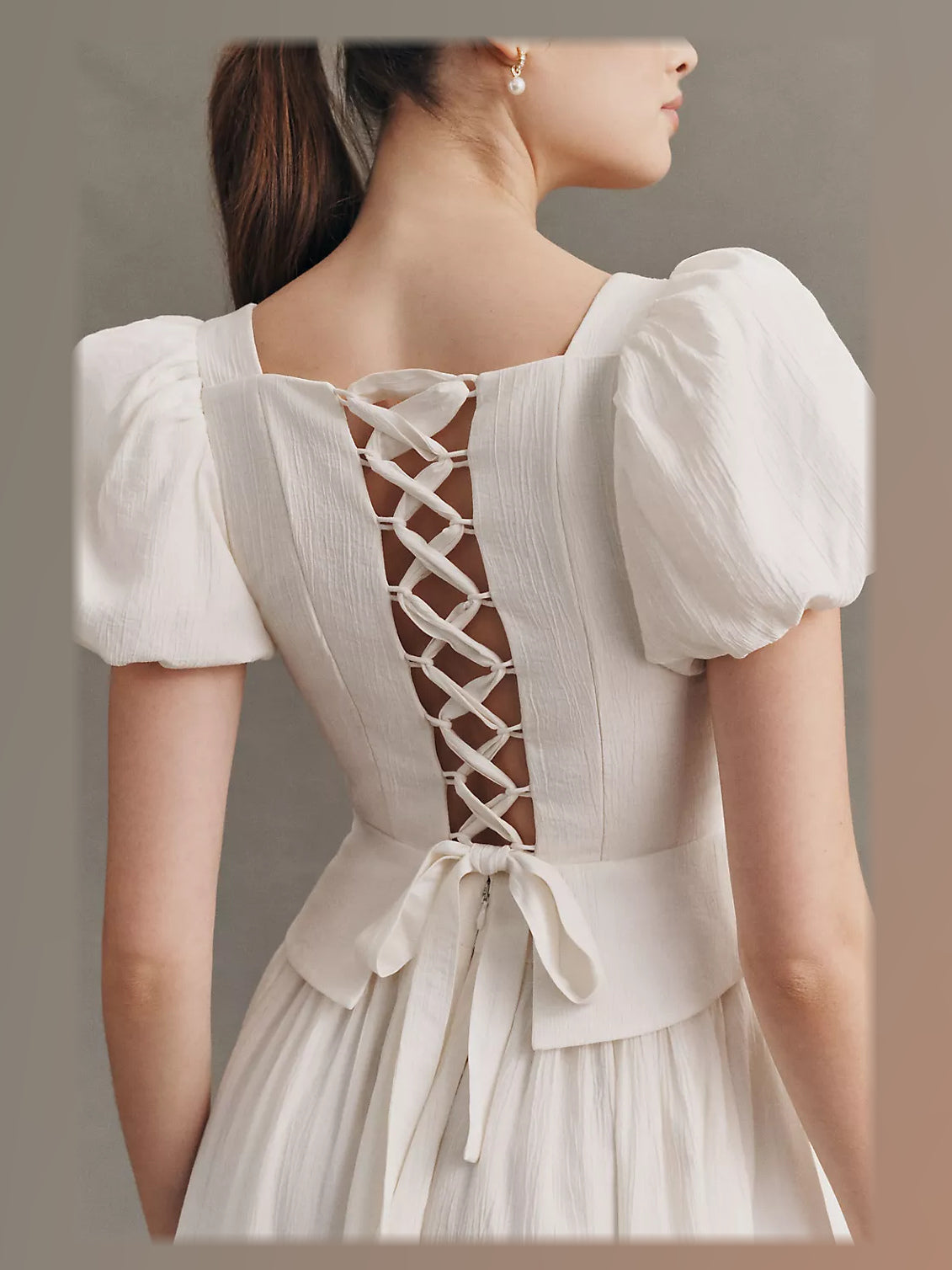 Ivory formal dress with corset detailing