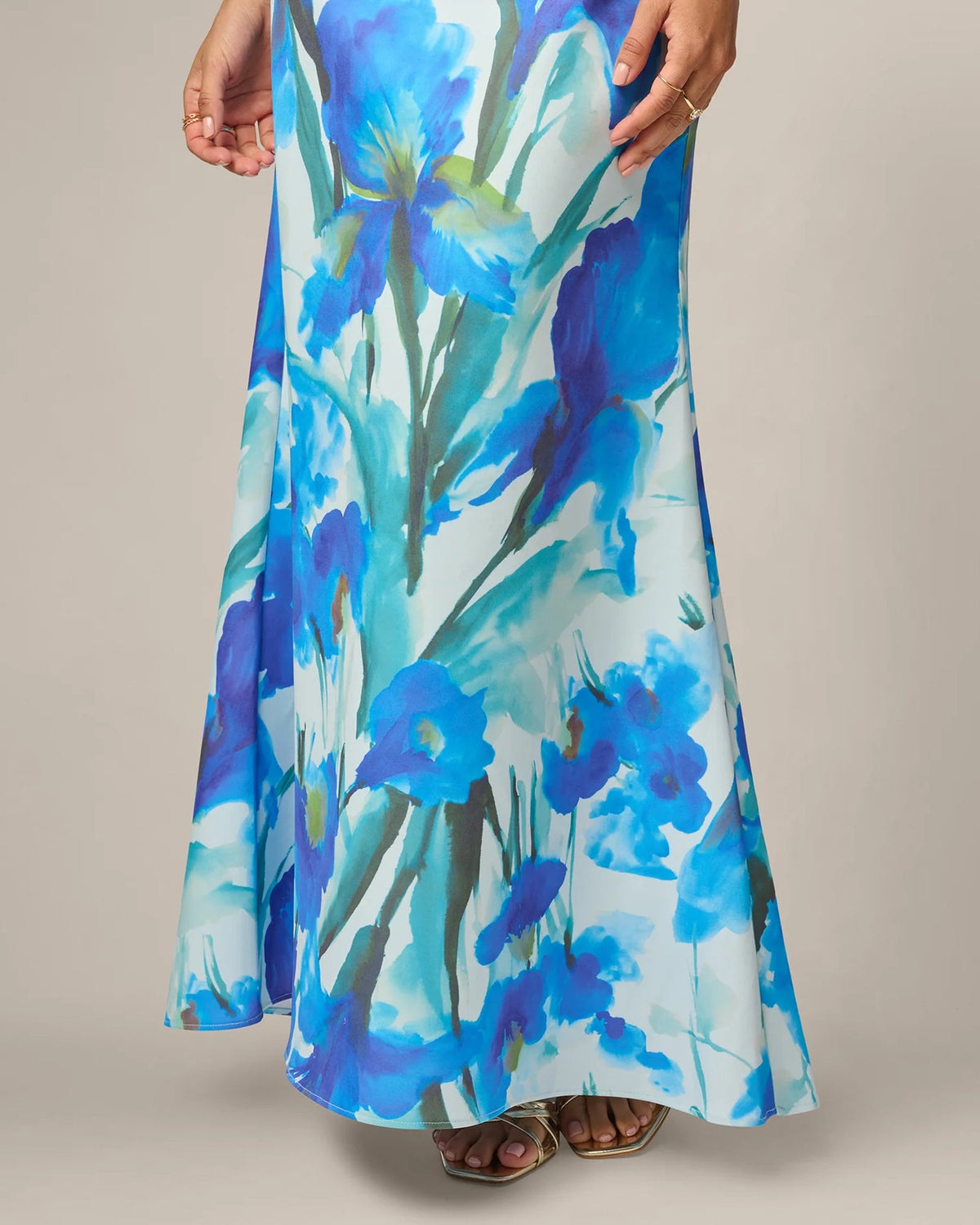 Blue floral mermaid maxi dress with flowing skirt and side seam profile