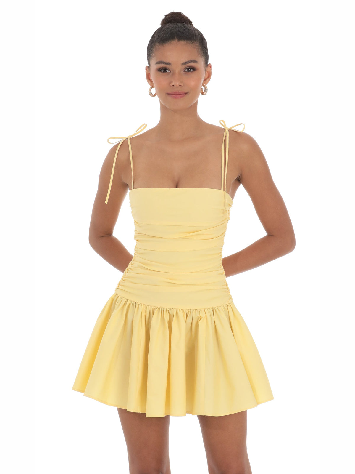 Yellow homecoming dress with ruched detailing