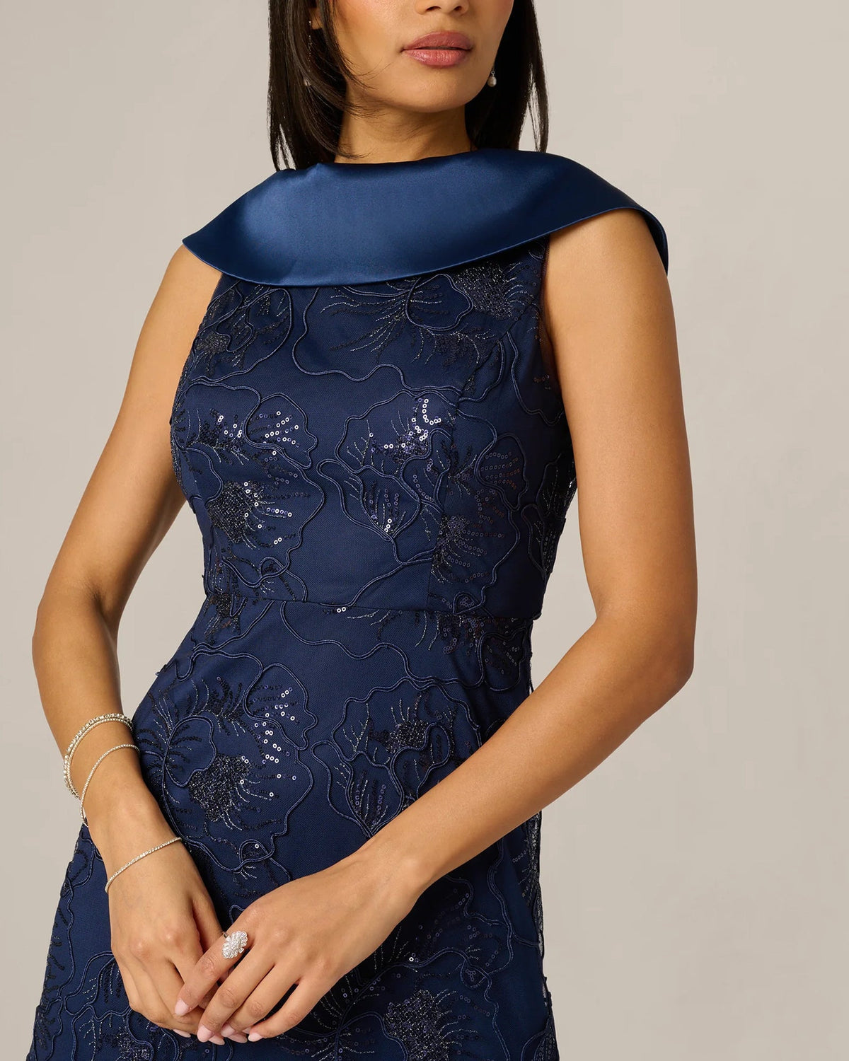 Midnight blue sleeveless lace A-line maxi dress with draped collar detail