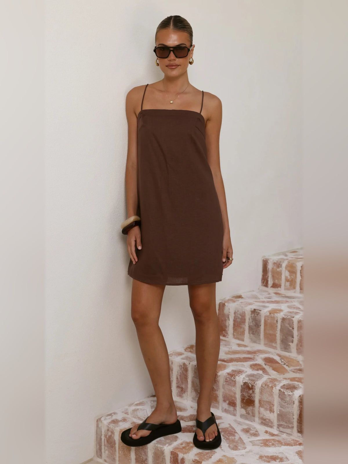 Brown mini dress, spaghetti straps and square neckline, short draped skirt