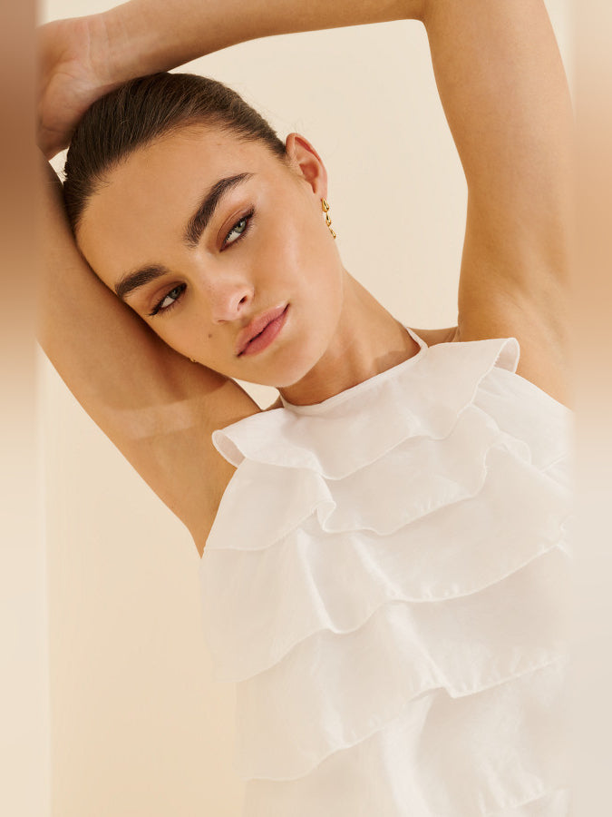 White ruffled halter mini dress with tiered layered skirt