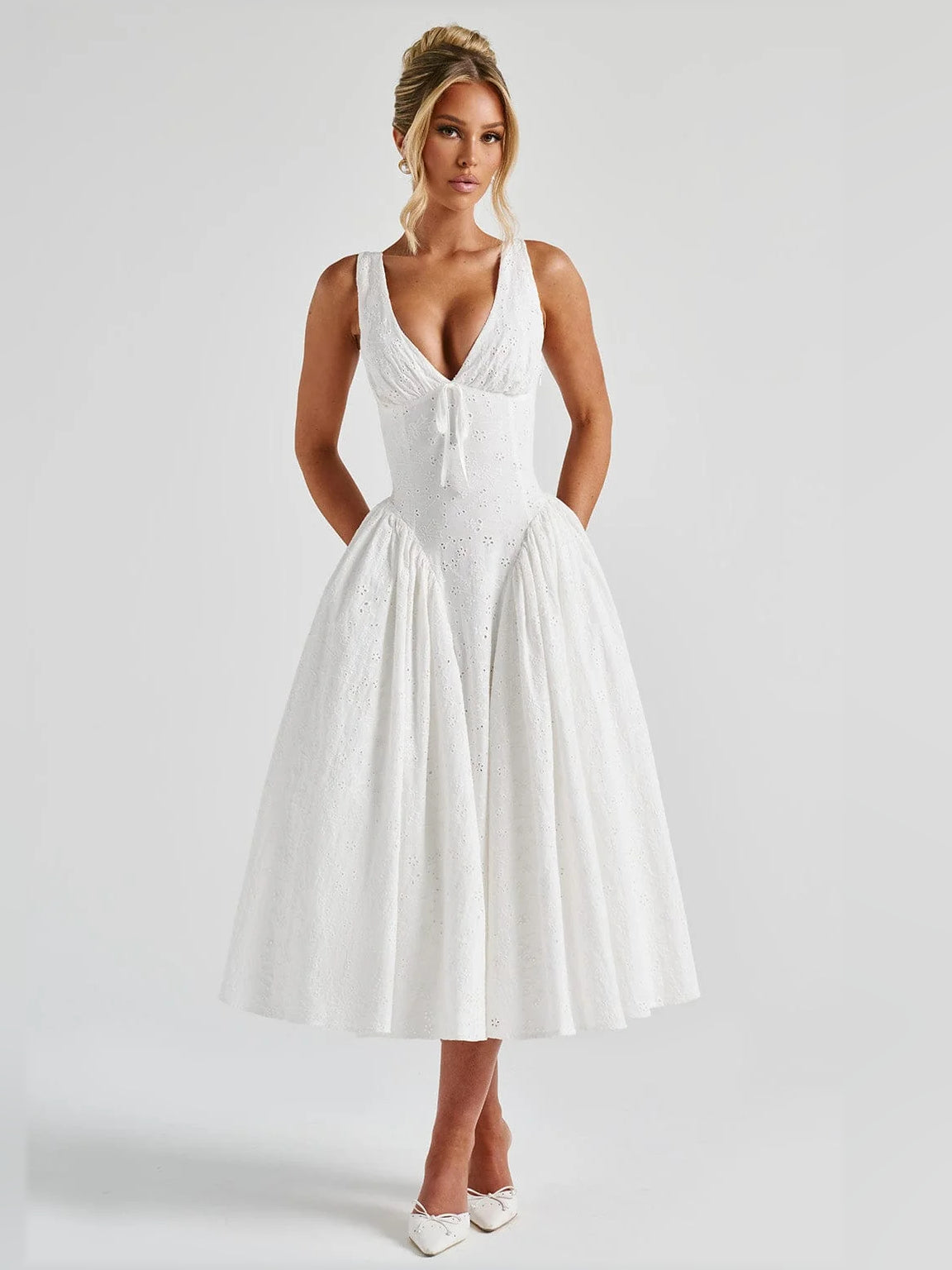 Ivory midi formal dress with deep V-neck, sleeveless fit-and-flare silhouette