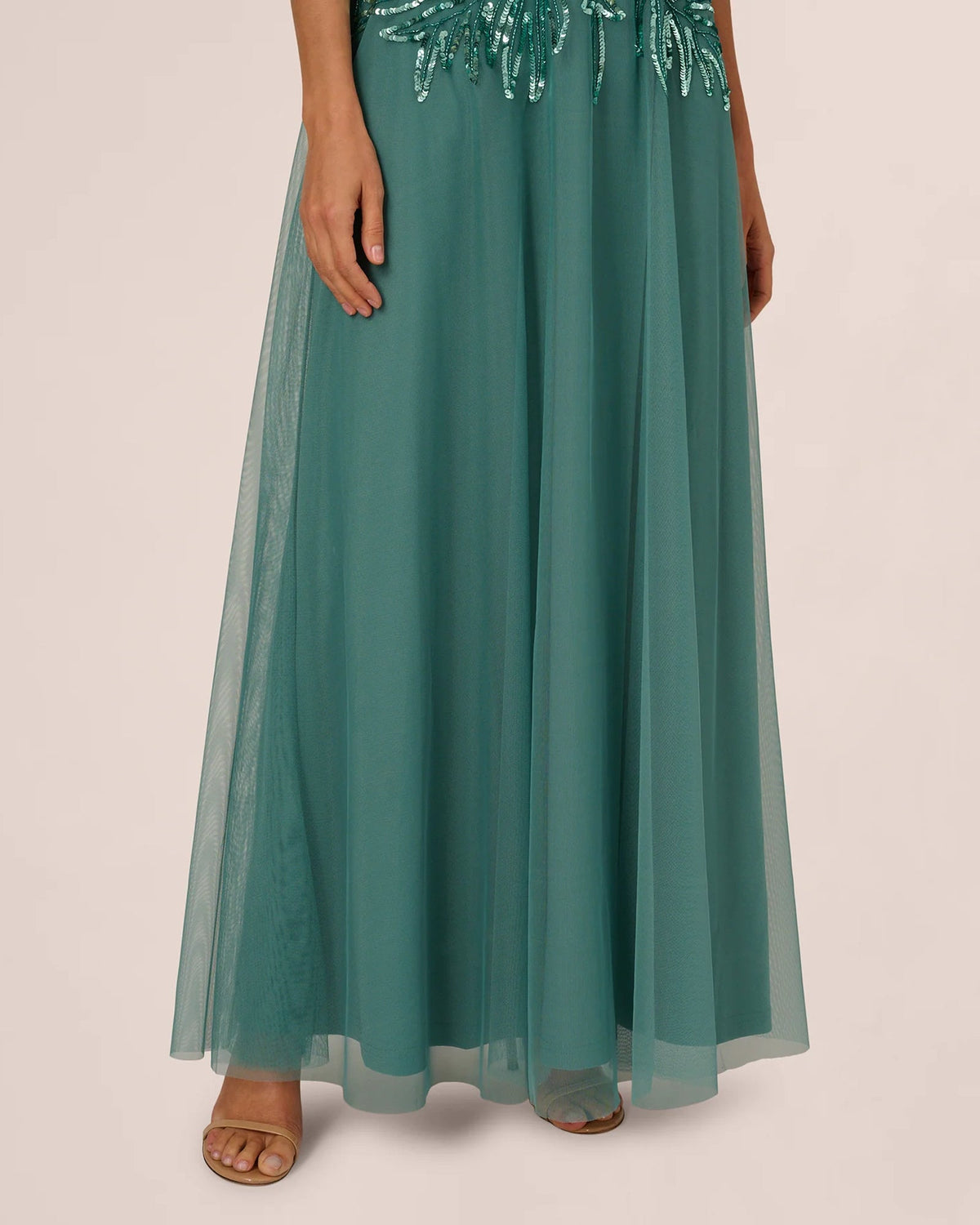Teal A-line maxi skirt with soft tulle overlay and gentle gathers at the waist