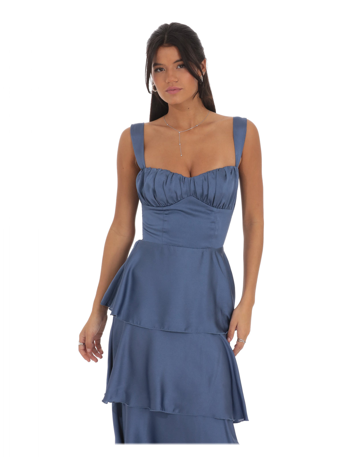 Slate blue satin sleeveless maxi dress with ruched sweetheart bodice and tiered skirt.