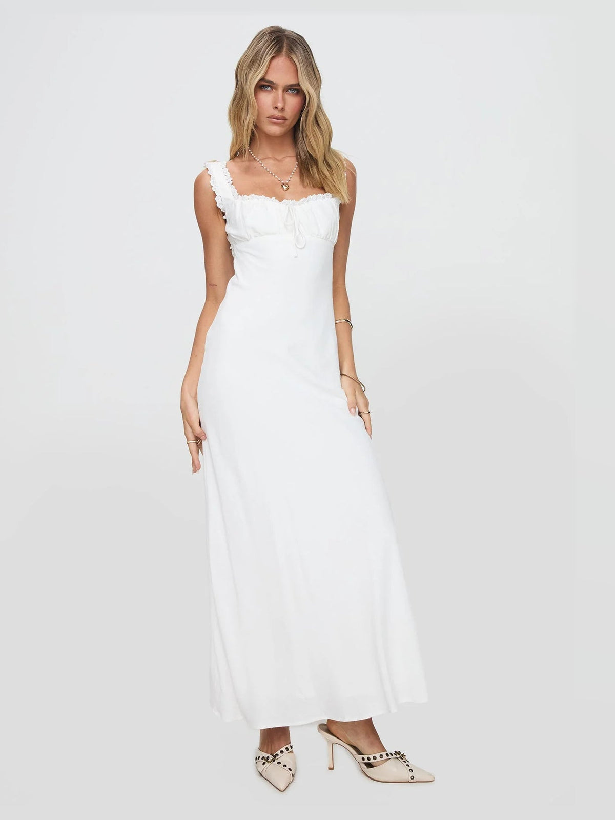 White formal dress with a-line detailing