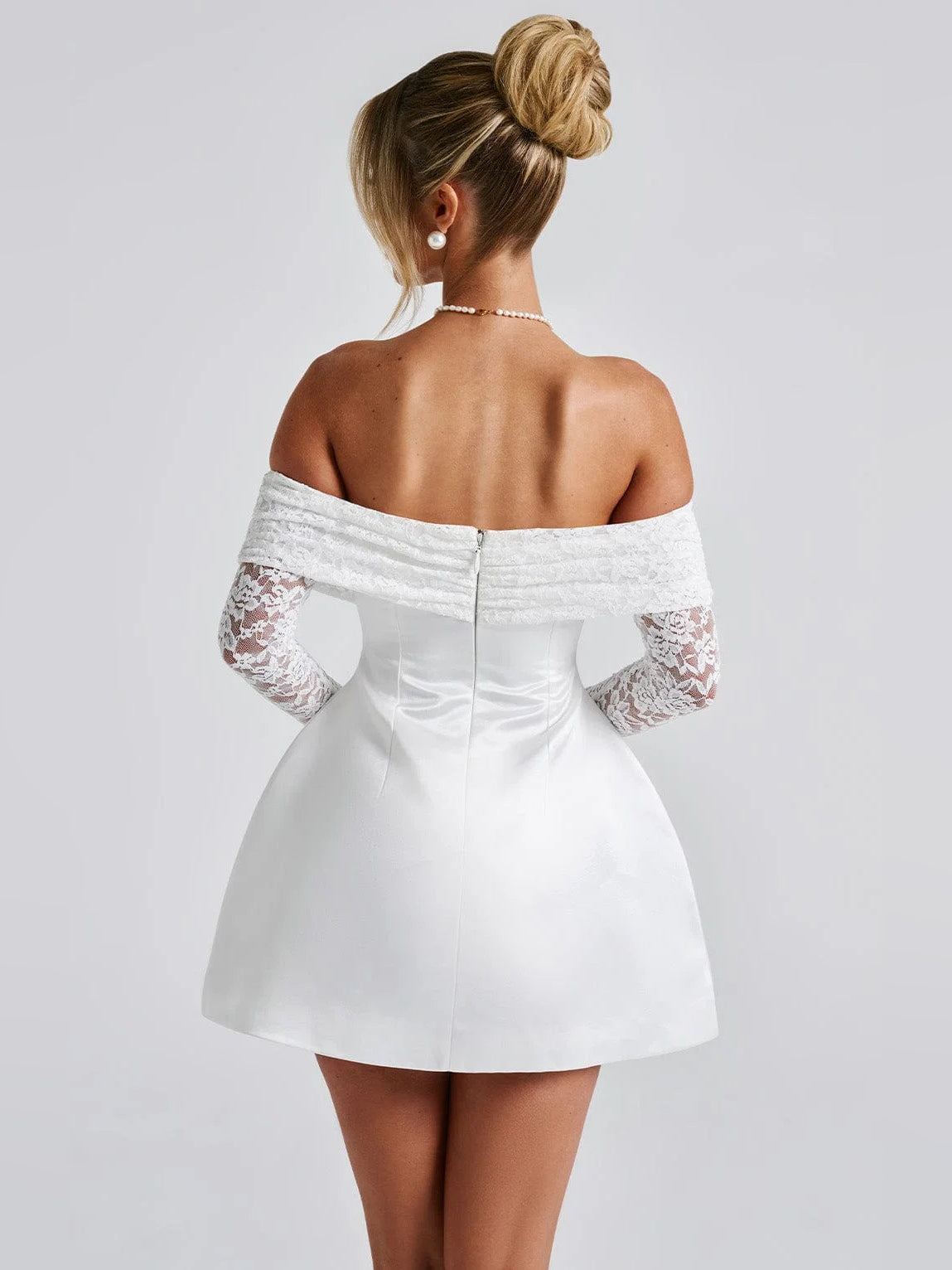 Ivory off-shoulder mini homecoming dress with long lace sleeves, back view