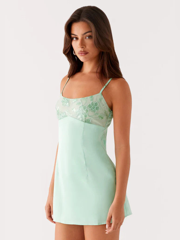 Sage mini homecoming dress with beaded floral upper panel and spaghetti shoulder straps