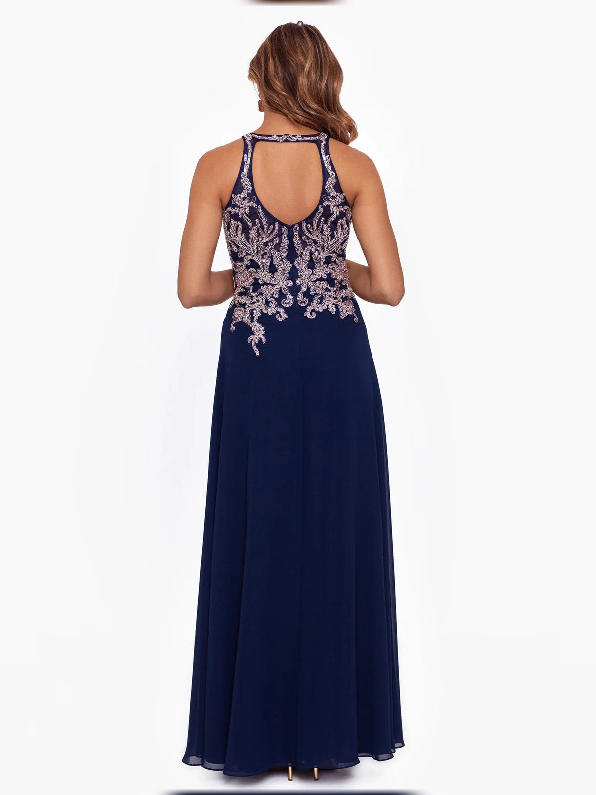 Back view of dark navy halter A-line chiffon dress with beaded open back