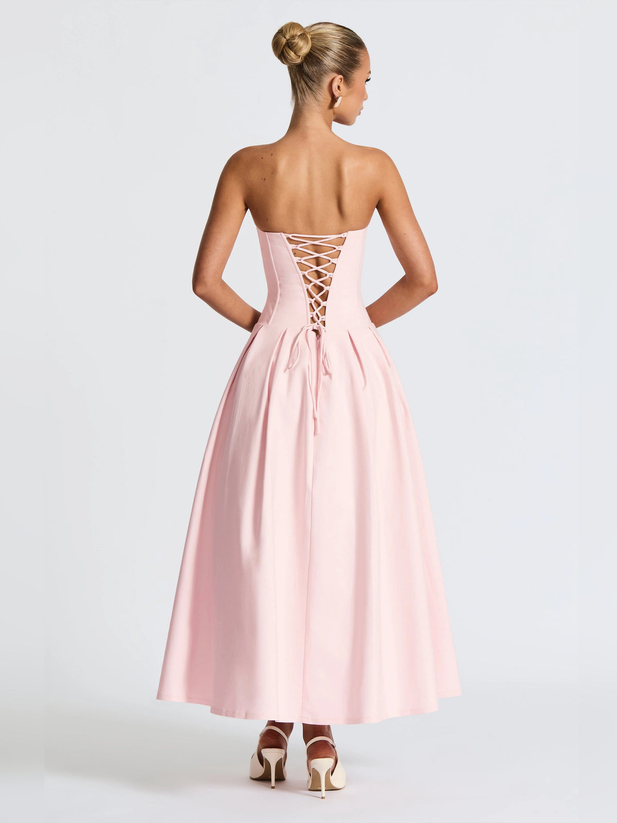 Blush pink midi formal dress with lace-up back and full pleated skirt