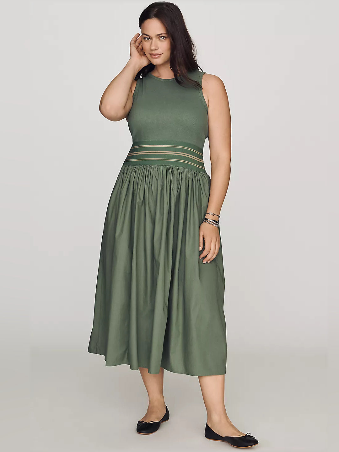 Green sleeveless midi dress with round neckline, striped waist band, gathered skirt