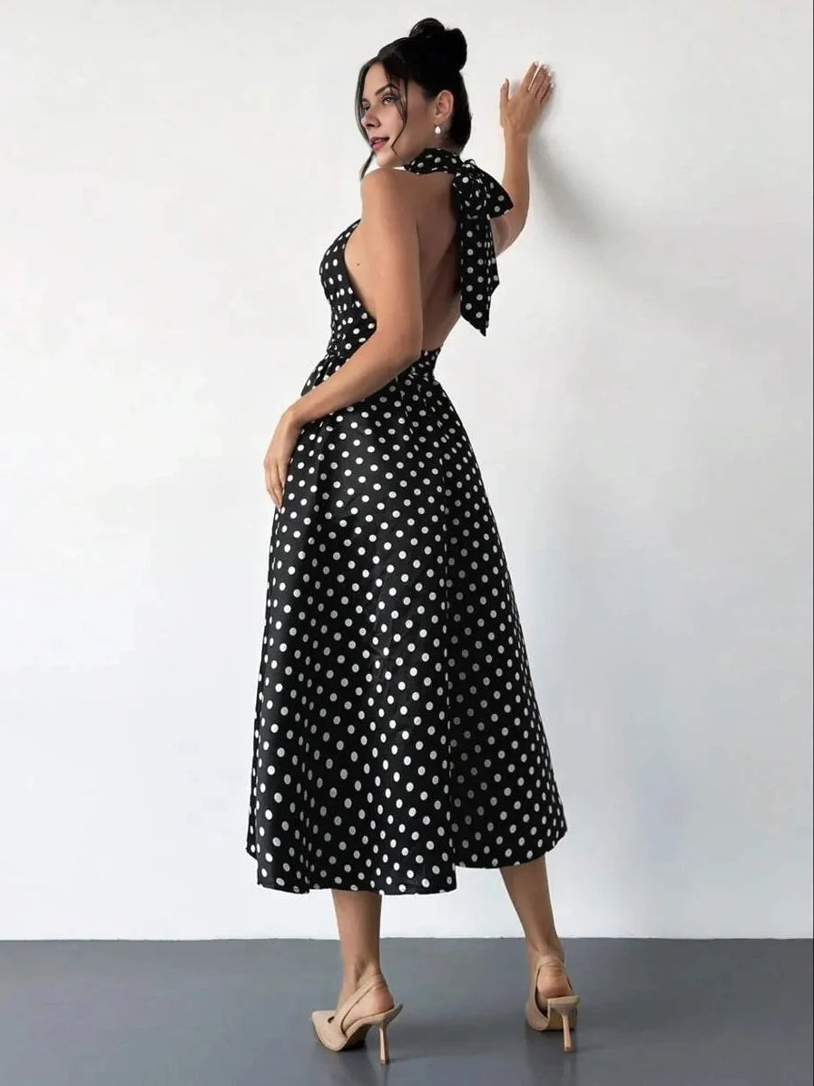 Black and white polka dot V-neck midi A-line dress with open back and neck tie