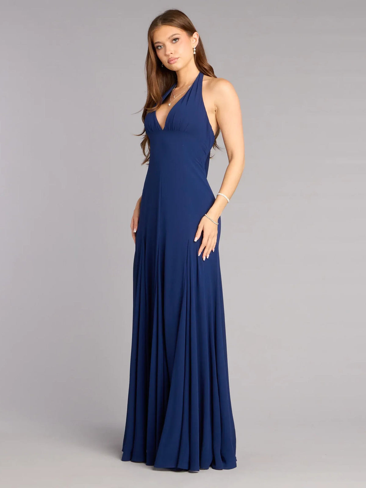 Dark navy halter V-neck A-line formal dress with gathered pleated skirt