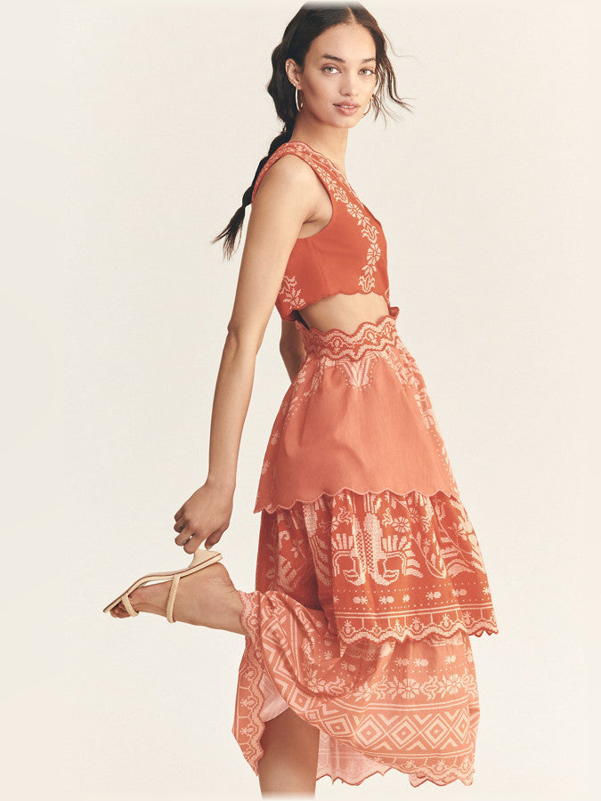 Orange sleeveless tiered ruffle midi dress with scalloped trim and tiered hem