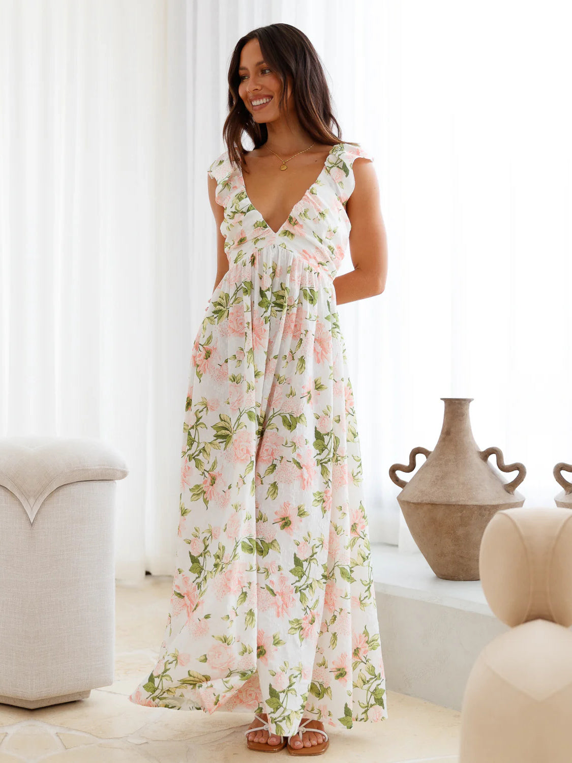 White a-line maxi formal dress with floral print, alternate view showing the waist