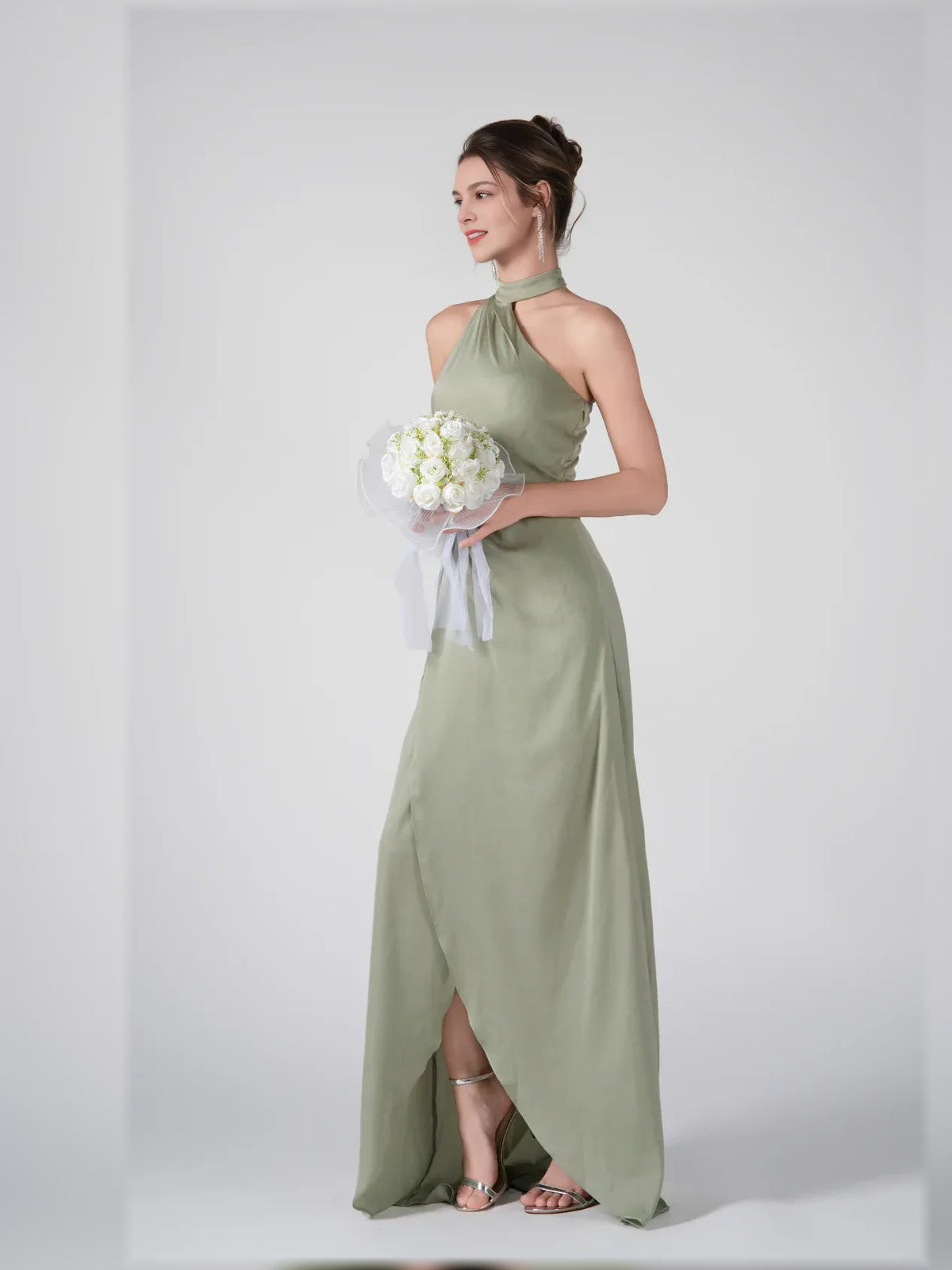 Dusty sage halter formal dress with draped waist and high front slit, floor-length.